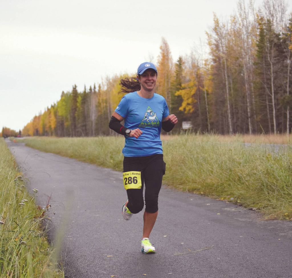 Anchorages Samantha Wilson, the womens half marathon winner, runs on Beaver Loop during the Kenai River Marathon on Sunday, Sept. 27, 2020, in Kenai, Alaska. (Photo by Jeff Helminiak/Peninsula Clarion)