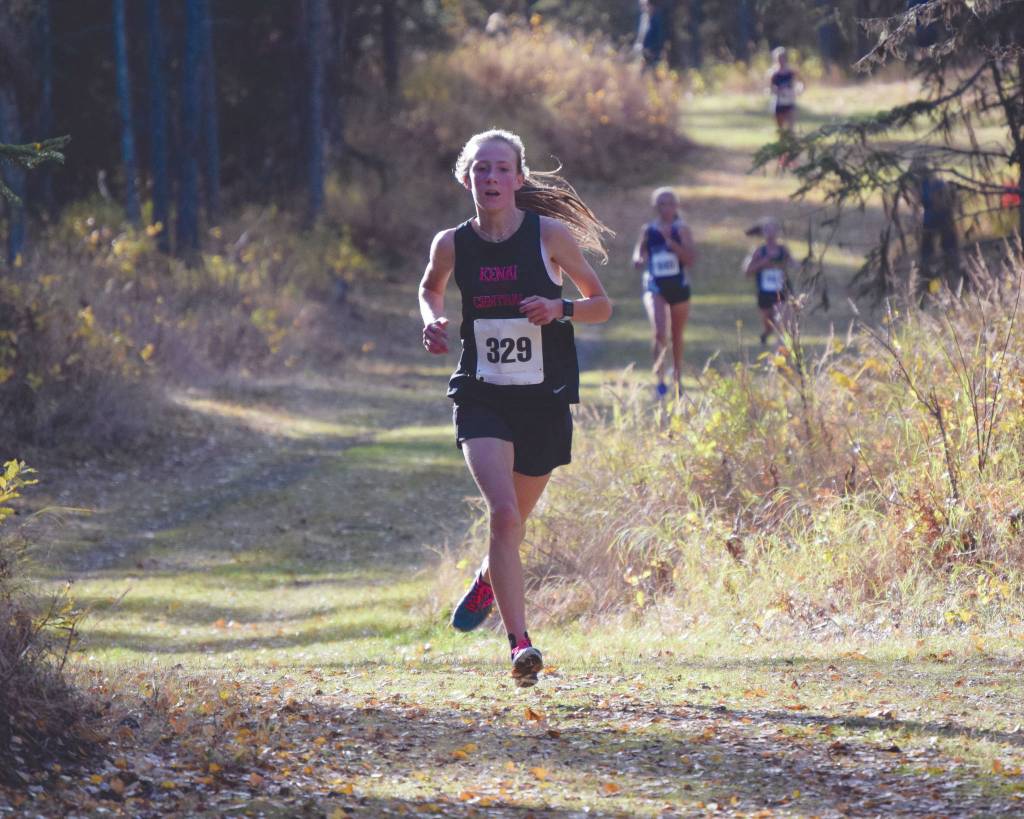 Kenai Central's Jayna Boonstra runs to victory at the Region III/Southern Division meet Saturday, Oct. 3, 2020, at Tsalteshi Trails near Soldotna, Alaska. (Photo by Jeff Helminiak/Peninsula Clarion)