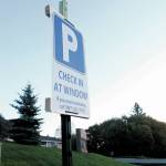 A sign directs people how to get a COVID-19 test once they part at South Peninsula Hospitals new testing site at 4201 Bartlett Street, the lower level of the hospitals specialty clinic, as seen on Tuesday, Oct. 6, 2020 in Homer, Alaska. Its a self-swab site where people perform their own tests, but nurses are on hand to greet people at their vehicles if they are unable to walk up to the testing windows. (Photo by Megan Pacer/Homer News)
