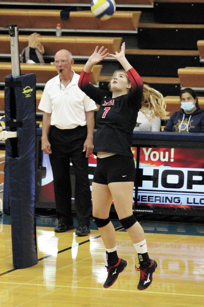 Kenais Emma Beck sets the ball during a Tuesday, Oct. 6, 220 volleyball game between the Kardinals and Homer High School in the Alice Witte Gymnasium in Homer, Alaska. (Photo by Megan Pacer/Homer News)