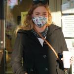 Lauren Jerew wears her Ruth Bader Ginsberg dissent collar to honor the late U.S. Supreme Court justice as she waits to vote at the Homer No. 1 precinct on Tuesday, Nov. 3, 2020 at Homer City Hall in Homer, Alaska. (Photo by Michael Armstrong/Homer News)