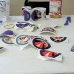 I Voted stickers wait on a table in the Kachemak Community Center for voters to pick them up Tuesday, Nov. 3, 2020 in Kachemak City, Alaska. (Photo by Megan Pacer/Homer News)