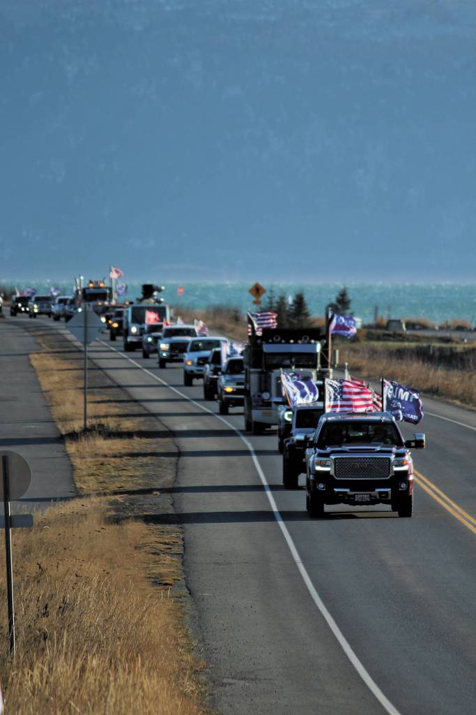 Participants in a vehicle parade to support President Donald Trump make their way off the Homer Spit on Sunday, Nov. 1, 2020 in Homer, Alaska. Organized by a Homer resident, the event was not part of similar parades that took place across the state and country over the weekend. (Photo by Megan Pacer/Homer News)