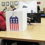 Voters cast their ballots in th e General Election at one of the two Homer precincts on Tuesday, Nov. 3, 2020 at Homer City Hall in Homer, Alaska. (Photo by Megan Pacer/Homer News)