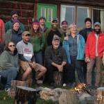 A group of veterans who participated in the 23rd Veteran trip to Homer, Alaska, pose at the Kilcher Family Homestead near Homer, Alaska, on the last day of the trip on Friday, Oct. 16, 2020. At far right, front, is Stellavera Kilcher, and third from right is Catkin Kilcher Burton, two of the Kilcher family members who participated in the visit. (Photo courtesy of 23rd Veteran)