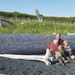 Eivin Kilcher with his children and their flotsam treasures on Ushagat Island in August 2020. (Photo by Eve Kilcher)