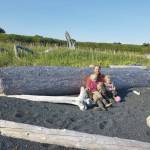 Eivin Kilcher with his children and their flotsam treasures on Ushagat Island in August 2020. (Photo by Eve Kilcher)
