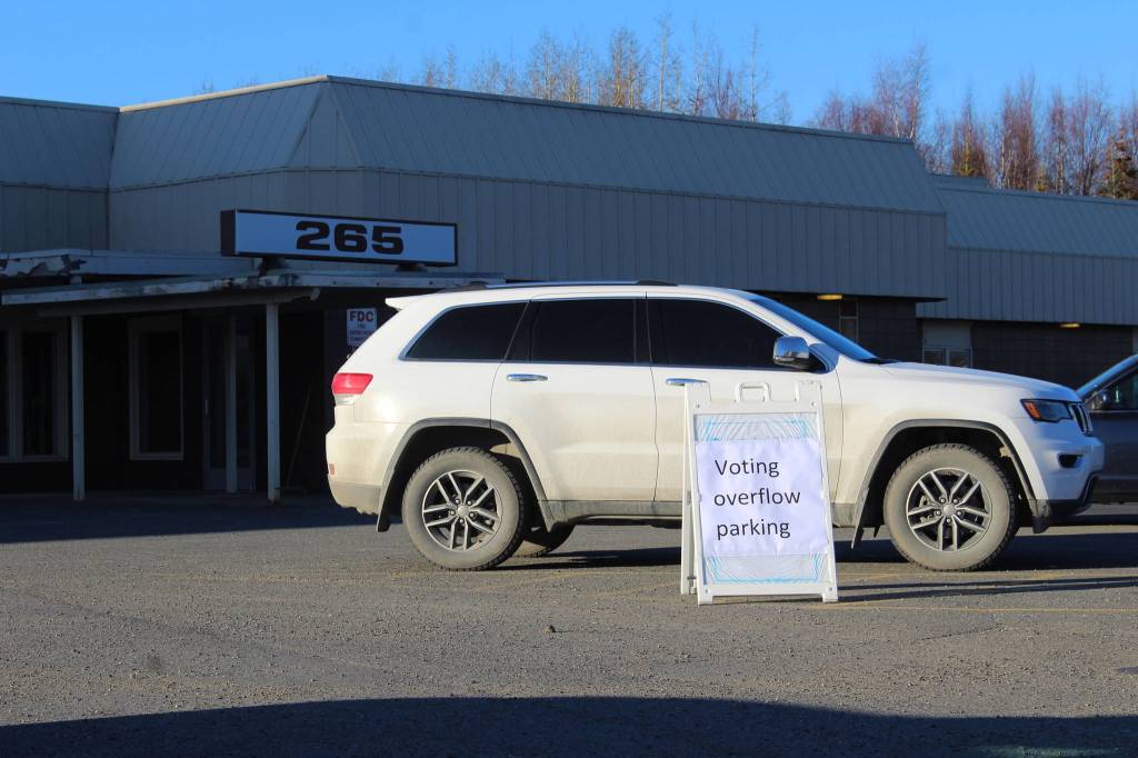 A sign indicating voting overflow parking is seen outside of the Soldotna Public Library on Tuesday, Nov. 3 in Soldotna, Alaska. (Photo by Ashlyn OHara/Peninsula Clarion)