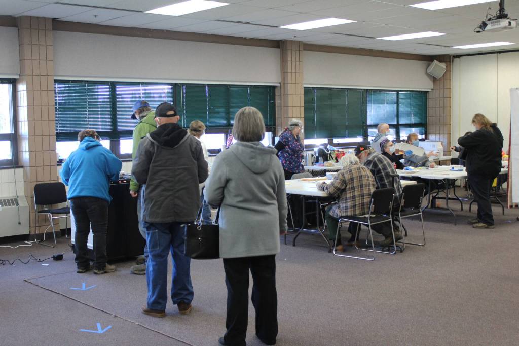 Voters line up to put their ballots in a ballot machine at the Soldotna Regional Sports Complex on Tuesday, Nov. 3 in Soldotna, Alaska. (Photo by Ashlyn OHara/Peninsula Clarion)
Voters line up to put their ballots in a ballot machine at the Soldotna Regional Sports Complex on Tuesday, Nov. 3 in Soldotna, Alaska. (Photo by Ashlyn OHara/Peninsula Clarion)