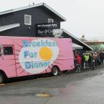 Locals wait in line to eat from the BFDfoodtruck (breakfast for dinner) on Sunday, Nov. 8, 2020 at Alices Champagne Palace in Homer, Alaska. The food truck was in town along with four others as part of the Food Network show The Great Food Truck Race. (Photo by Megan Pacer/Homer News)