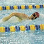 Kenais Rachel Pitsch swims the girls 500-yard freestyle on Saturday, Nov. 14, 2020 during the Kenai Peninsula Swimming Championships at the Kate Kuhns Aquatic Center in Homer, Alaska. (Photo by Megan Pacer/Homer News)