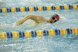 Kenais Rachel Pitsch swims the girls 500-yard freestyle on Saturday, Nov. 14, 2020 during the Kenai Peninsula Swimming Championships at the Kate Kuhns Aquatic Center in Homer, Alaska. (Photo by Megan Pacer/Homer News)