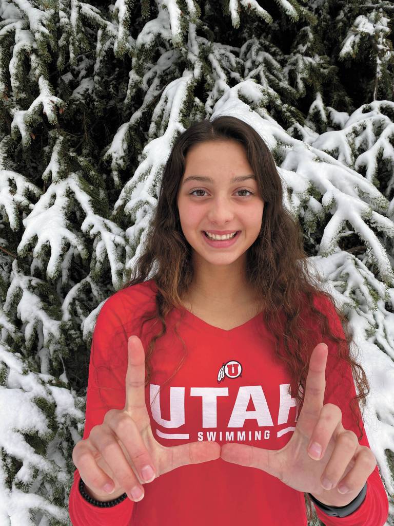 Homer High School senior Madison Story celebrates signing her National Letter of Intent to swim at the University of Utah. (Photo courtesy Paul Story)