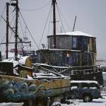 Snow falls on the Cape Lynch, right, and other boats on Sunday, Nov. 29, 2020, on the Homer Spit in Homer, Alaska. (Photo by Michael Armstrong/Homer News).