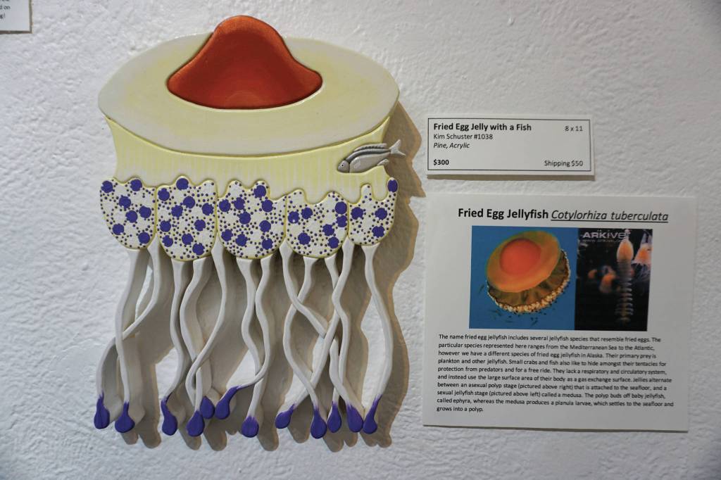 Fried egg jelly with a fish is one of the pieces in Kim Schusters exhibit, Science Observed Through Art: Unsung Species, as seen here on Friday, Dec. 4, 2020, at Ptarmigan Arts in Homer, Alaska. (Photo by Michael Armstrong/Homer News)