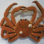 "Tanner Crab with Barnacles" is one of the wood sculptural pieces in Kim Schuster’s exhibit, “Science Observed Through Art: Unsung Species,” as seen here on Friday, Dec. 4, 2020, at Ptarmigan Arts in Homer, Alaska. (Photo by Michael Armstrong/Homer News)