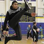 James Mishakoff of Tebughna School in Tyonek just misses connecting with the ball during the one-foot high kick event at the Kachemak Bay Traditional Games, a Native Youth Olymics invite, Saturday, March 7, 2020 at Homer High School in Homer, Alaska. (Photo by Megan Pacer/Homer News)