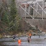 Anglers fish for steelhead in the Anchor River by the Anchor River Bridge on Saturday, Oct. 17, 2020, in Anchor Point, Alaska. (Photo by Michael Armstrong/Homer News)