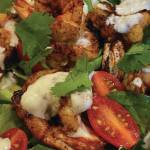 Warm chili shrimp salad with little gems and tomatoes makes a festive holiday dish with its Christmas red-and-green colors, as seen here on Tuesday, Dec. 22, 2020, in the kitchen of her Homer, Alaska, home. (Photo by Teri Robl)