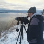 Tim Quinn looks for birds in Kachemak Bay during the Christmas Bird Count on Saturday, Dec. 19, 2020, in Homer, Alaska. (Photo by Jim Herbert)