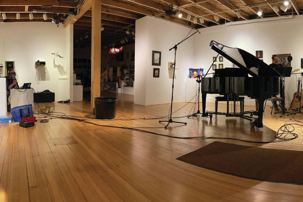 Tyler Munns, left, and Jeff Lockwood, right, perfom live on Dec. 18, 2020, for KBBI from the Bunnell Street Arts Center in Homer, Alaska. (Photo courtesy of Tyler Munns and Jeff Lockwood)