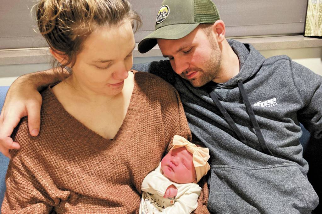 Victoria and Robert Walker hold their daughter, Eleanor, Homer's New Year baby. (Photo courtesy Derotha Ferraro/South Peninsula Hospital)