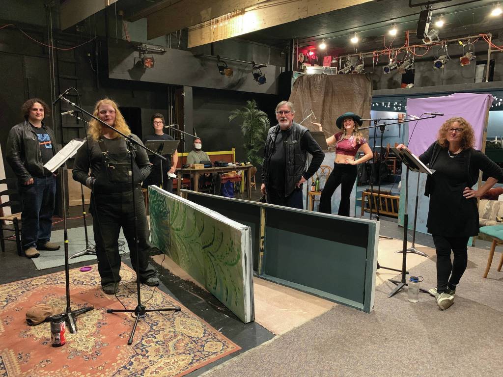 The cast and crew of Knife Skills poses for a photo at Pier One Theatre during a recording session in August in Homer, Alaska. From left to right are Peter Sheppard, Theodore Castellani, Chloë Pleznac, Joshua Krohn (sitting, at sound board), Darrel Oliver, Helen-Thea Marcus and Ingrid Harrald. (Photo courtesy of Lindsey Schneider)