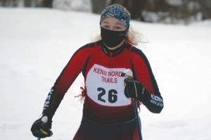 Kenai Centrals Emily Moss takes the victory in the girls race at the Kenai Nordic Trails on Saturday, Jan. 16, 2021, at Kenai Golf Course. (Photo by Jeff Helminiak)