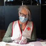 Health & Wellness Educator Bonita Banks, a nurse at South Peninsula Hospital, prepares to remove a dose of the Moderna vaccine from a vial Friday, Jan. 15, 2021 during a vaccination clinic for seniors put on by the hospital and the City of Homer at Christian Community Church in Homer, Alaska. (Photo by Megan Pacer/Homer News)