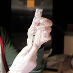 Health & Wellness Educator Bonita Banks, a nurse at South Peninsula Hospital, extracts dose of the Moderna vaccine from a vial Friday, Jan. 15, 2021 during a vaccination clinic for seniors put on by the hospital and the City of Homer at Christian Community Church in Homer, Alaska. (Photo by Megan Pacer/Homer News)