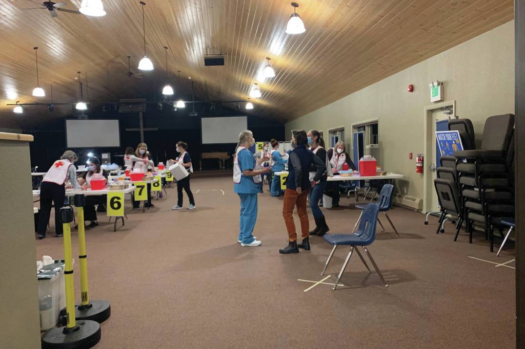Hospital staff and volunteers prepare for a vaccination clinic Friday, Jan. 15, 2021 at Christian Community Church in Homer, Alaska. It was the first major vaccine clinic for seniors on the Kenai Peninsula. (Photo courtesy Derotha Ferraro/South Peninsula Hospital)