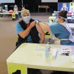 Homer Mayor Ken Castner gets his first dose of the Moderna vaccine at a two-day clinic held last Friday and Saturday, Jan. 15-16, 2021 at Christian Community Church in Homer, Alaska. The clinic was put on by South Peninsula Hospital, the City of Homer and Alaska Public Health. (Photo courtesy Derotha Ferraro/South Peninsula Hospital)
