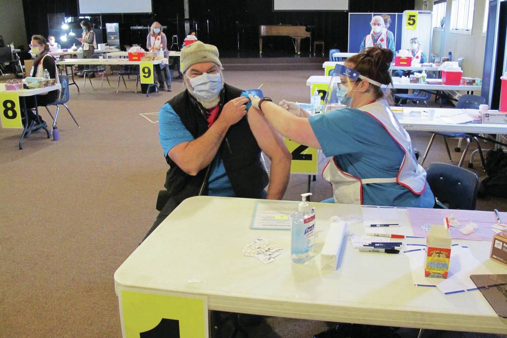 Homer Mayor Ken Castner gets his first dose of the Moderna vaccine at a two-day clinic held last Friday and Saturday, Jan. 15-16, 2021 at Christian Community Church in Homer, Alaska. The clinic was put on by South Peninsula Hospital, the City of Homer and Alaska Public Health. (Photo courtesy Derotha Ferraro/South Peninsula Hospital)