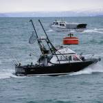 The Huntress, bottom, and the Rainisong, top, leave the Homer Harbor on Thursday, Jan. 28, 2021, in Homer, Alaska. (Photo by Michael Armstrong/Homer News)