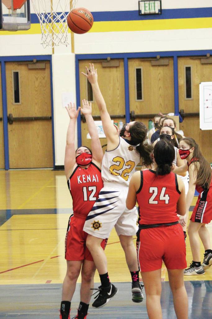 Homers Hannah Hatfield goes up for a basket during a Tuesday, Feb. 9, 2021 basketball game against Kenai Central in the Alice Witte Gymnasium in Homer, Alaska. (Photo by Megan Pacer/Homer News)
