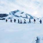 A group of explorers led by a guide tour the Matanuska Glacier on Jan. 17, 2021 in the Matanuska-Susitna Borough, Alaska. (Photo by Megan Pacer/Homer News)