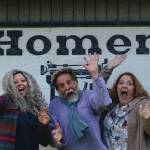 The author (left) enjoys taking a corporate photo with Editor Michael Armstrong (center) and advertising rep Malia Anderson (right) at the Homer News office in Homer, Alaska. (Photo by Michael Armstrong/Homer News)