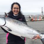Derotha Ferraro from the fishing vessel Big Game poses with the king salmon she caught at the Anchor Point King Salmon Calcutta on Sunday, May 12, 2019, in Anchor Point, Alaska. Ferraros fish was one of the top ten fish caught in the tournament, weighing more than 20 pounds. (Photo courtesy of Bill Scott)