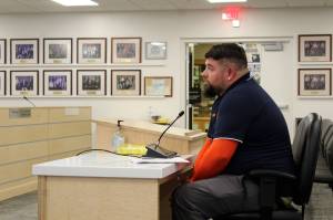 Aaron Fleenor testifies before the Kenai Peninsula Borough Assembly on Tuesday, April 6, 2021, in Soldotna, Alaska. (Ashlyn OHara/Peninsula Clarion)