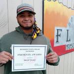 Homer Flex High School Phoenix Award winner David Young holds his certificate on March 25, 2021, at Flex High School in Homer, Alaska. (Photo courtesy of Homer Flex High School)