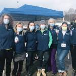 The South Peninsula Hospital vaccine team pose for a photo during a pop-up clinic for Homer Community Food Pantry volunteers and clients on Monday, April 12, 2021, at Homer United Methodist Church in Homer, Alaska. From left to right are Rosanna Hunting, Annie Garay, RN; Anna Lewald, MPH, RN; Dr. Christy Tuomi, Bonita Banks, BSN, RN; Shari Daugherty and volunteer Mary Hayden. (Photo courtesy of South Peninsula Hospital)