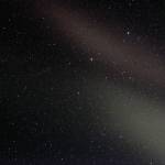 An atmospheric phenomena called STEVE  for Sudden Thermal Emission from Velocity Enhancement  is seen in the southern sky early on Saturday, April 17, 2021, from Diamond Ridge near Homer, Alaska. The STEVE appeared the same night as a strong display of auroras to the north. Don Hampton, a research associate and faculty member at the University of Alaska Fairbanks Geophysical Institute, said STEVEs are not auroras, but a stream of charged particles or sub-aurora polarization streams. Its actually primarily a different phenomena or mechanism that is creating light, Hampton said of STEVEs. A STEVE is more of a broadband emission than an aurora and can be distinguished by its color of light. Auroras tend to be green or vivid red, while a STEVE appears white to the human eye and may have tinges of red. Hampton said scientists knew about streams of charged particles that are not auroras, but hadnt thought to look if theres an optical phenomena associated with. Aurora chasers in Canada first noticed the optical phenomena in 2014, and it was named by Chris Ratzlaff as a joke reference to the film Over the Hedge, where the animals called the hedge Steve. NASA scientist Elizabeth Macdonald came up with the description. Its pretty cool, Hampton said. The whole history of the STEVE is that its a citizen scientist discovery. (Photo by Michael Armstrong/Homer News)