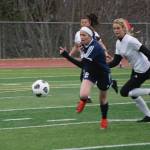 Lady Mariner Laura Inama, striker, moves the ball toward the Kenai Kardinals goal on Thursday, April 22, 2021, at the Homer High School field in Homer, Alaska. (Photo by Michael Armstrong/Homer News)
