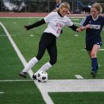 Lady Mariner Ava Halstead, midfield, defends against Kenai Kardinals No. 17 on Thursday, April 22, 2021, at the Homer High School field in Homer, Alaska. (Photo by Michael Armstrong/Homer News)