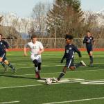 Mariners Eyoab Knapp steals the ball from a Grace Christian School player during the soccer game April 30, 2021, at the Homer High School soccer field. (Photo by Sarah Knapp/Homer News)