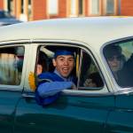 A Homer High School senior celebrates his graduation during the parade through Homer. (Photo by Sarah Knapp/Homer News)