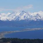The Homer Spit and the Kenai Mountains catch the afternoon sunshine of Monday, May 17, 2021, as seen from West Hill in Homer, Alaska. (Photo by Michael Armstrong/Homer News)