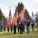 The American Legion Posts 16 and 19 and the Veterans of Foreign Wars Post 10221 color guards stand at attention during the 2021 Memorial Day service held at Hickerson Memorial Cemetery on May 31. (Photo by Sarah Knapp/Homer News)