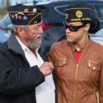 Two veterans catch up at the 2021 Memorial Day service held at Hickerson Memorial Cemetery on May 31. (Photo by Sarah Knapp/Homer News)