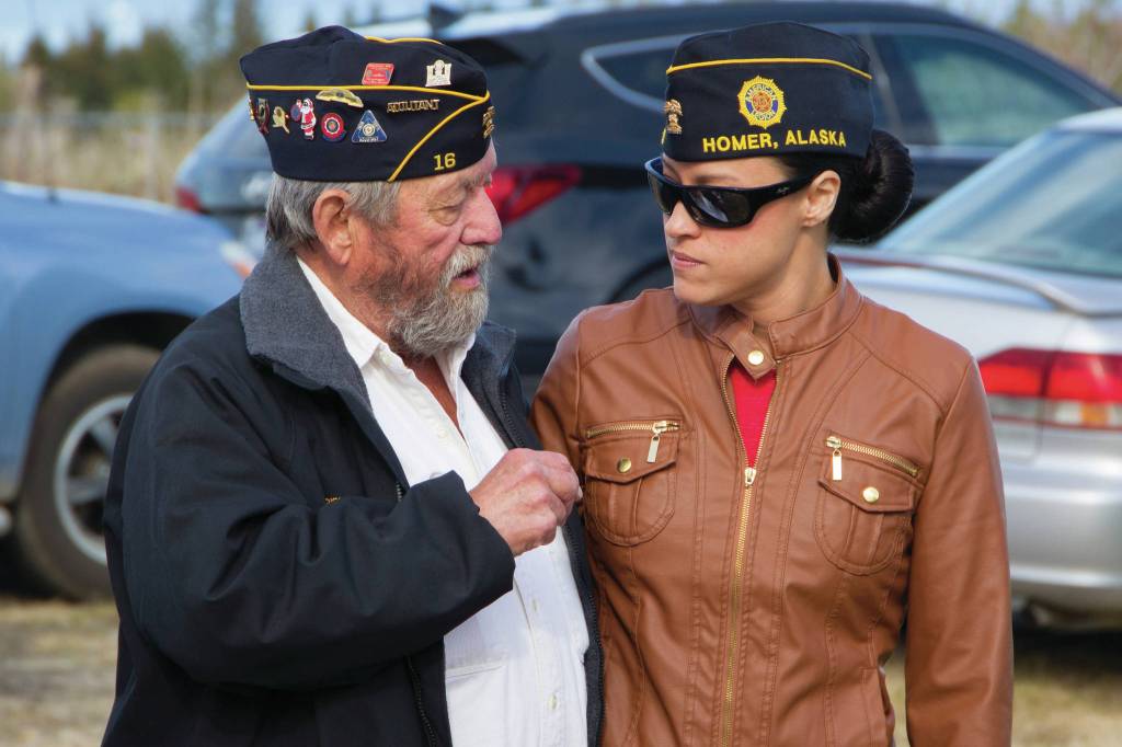 Two veterans catch up at the 2021 Memorial Day service held at Hickerson Memorial Cemetery on May 31. (Photo by Sarah Knapp/Homer News)